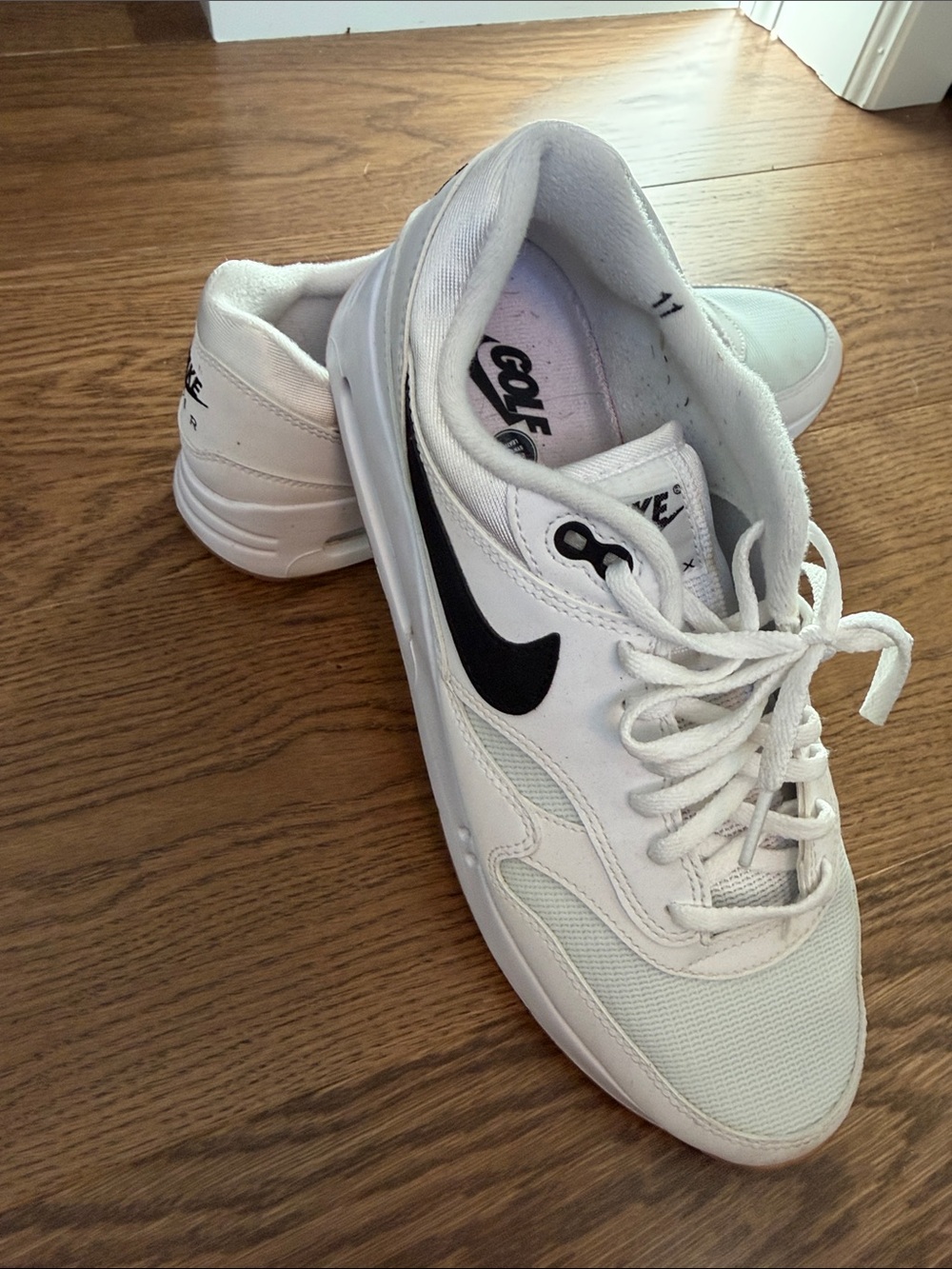 Nike Men’s White Golf Sneakers with Black Swoosh Accent